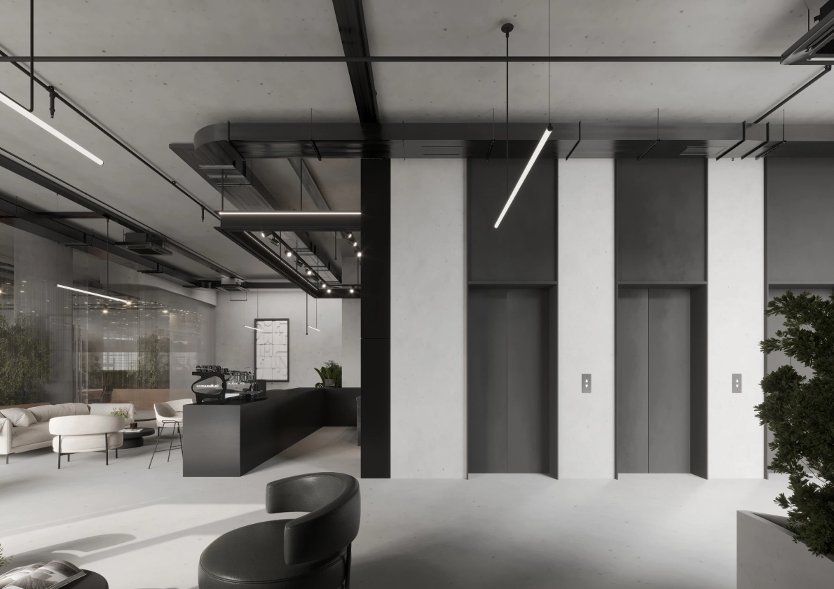 Glowing Tower Reception with a view of its elevators and furniture, looks very modern!